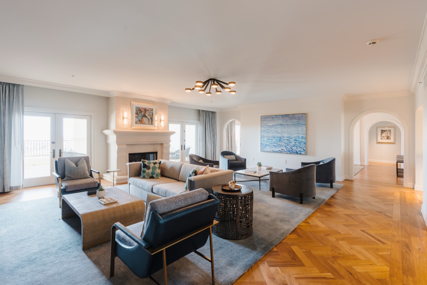 Resort suite interior with fireplace and lounge seating