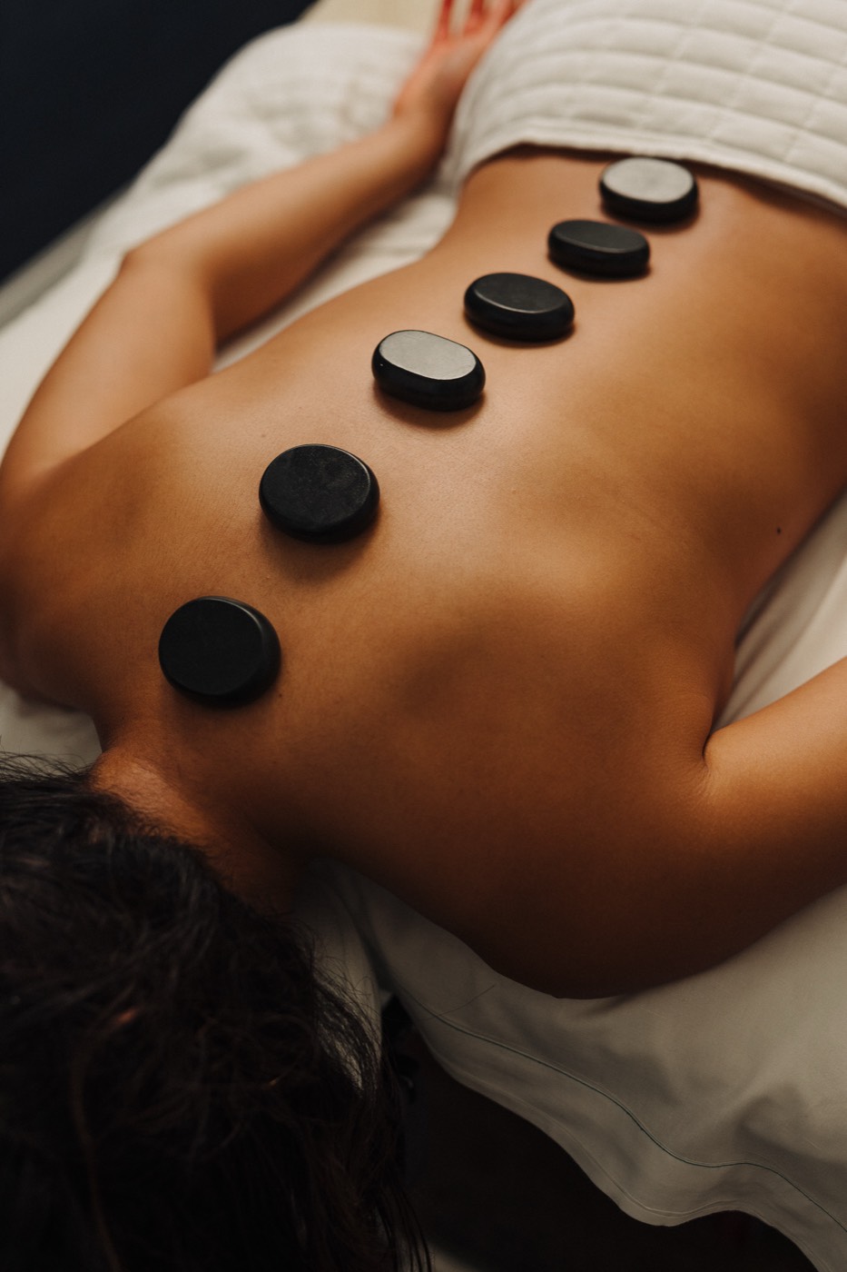 Hot stone massage treatment at the spa